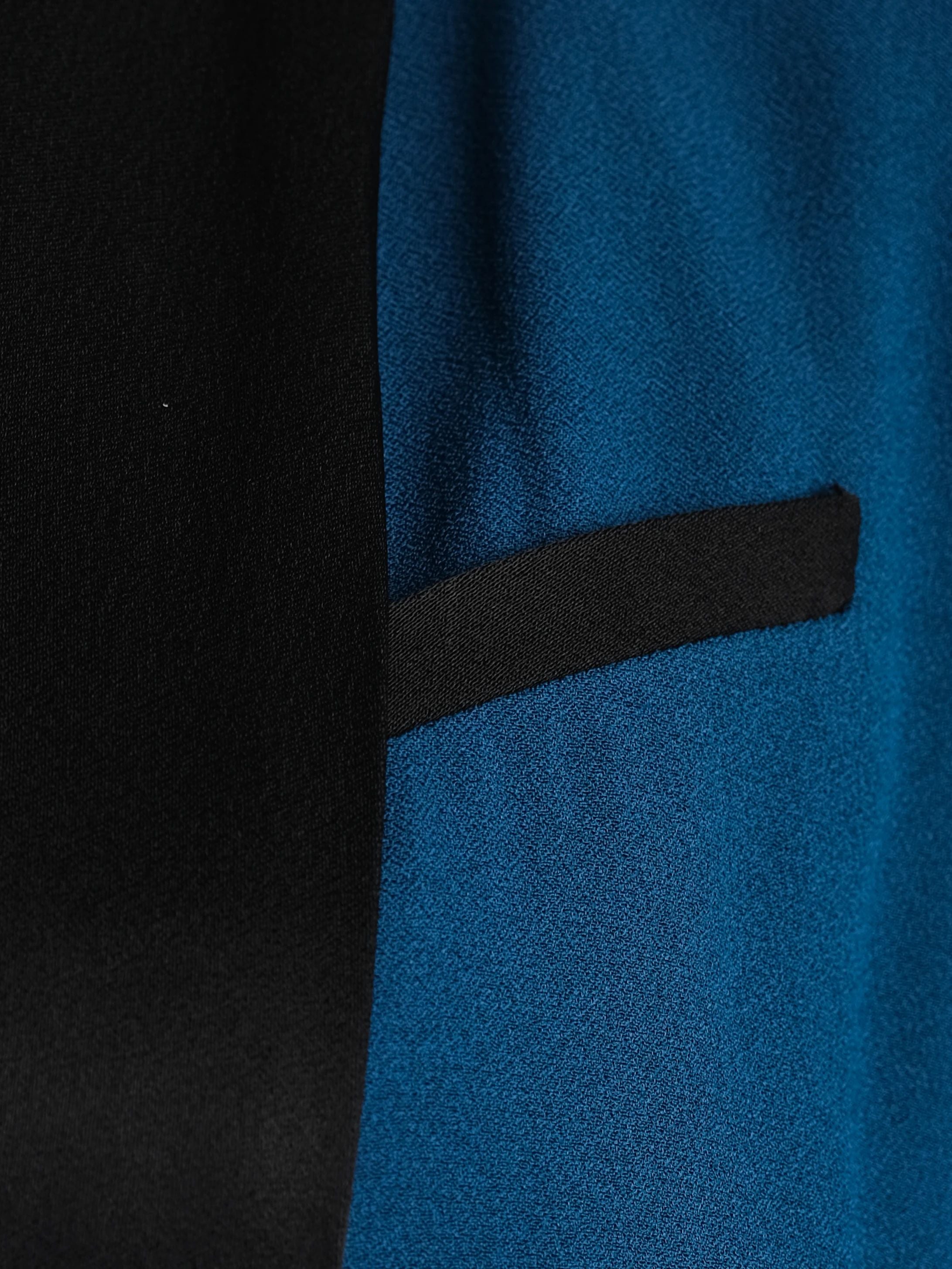 Excellent Rachel Zoe Teal Jumpsuit XS with Black Lapels & Cuffs