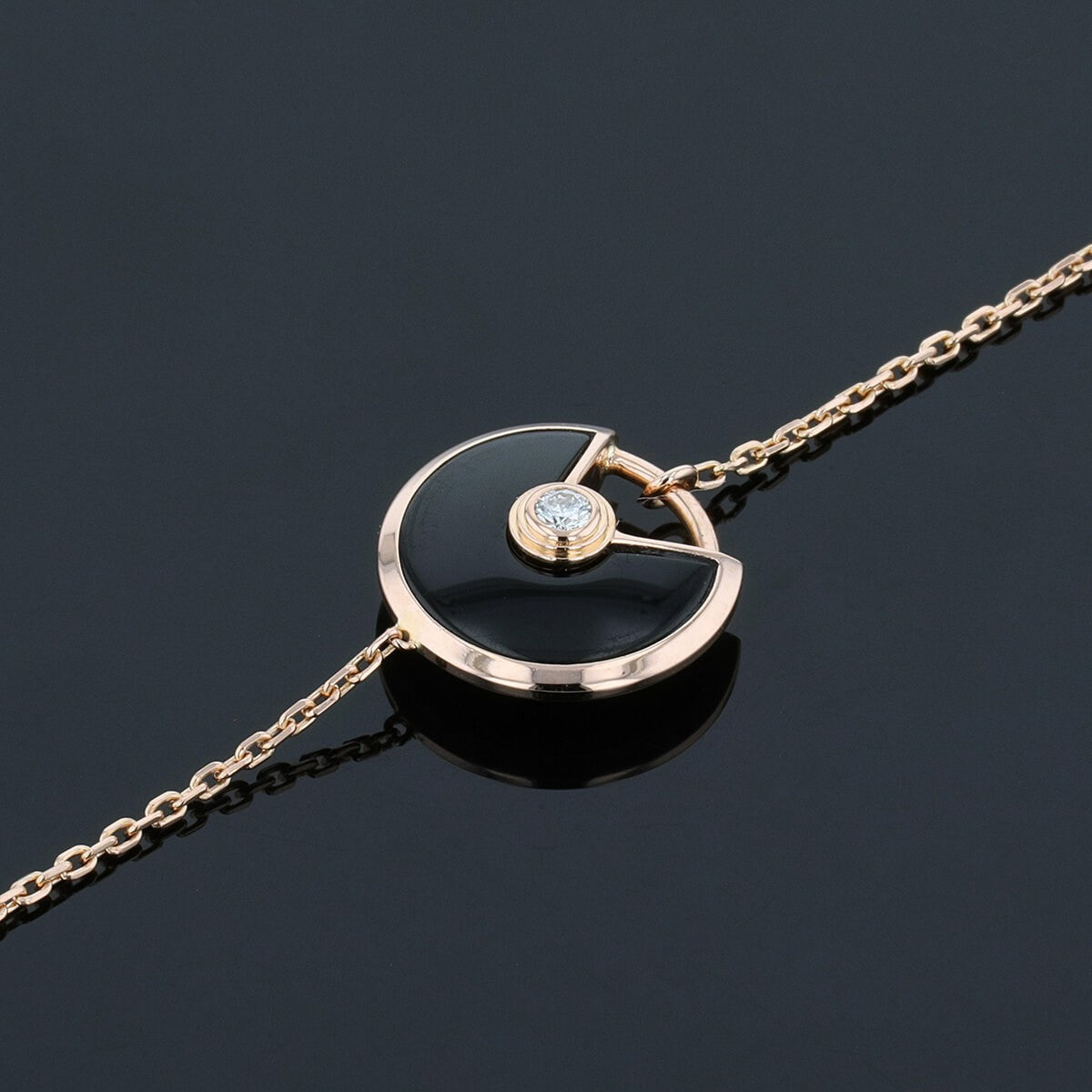 Cartier Amulette XS onyx, diamond and gold bracelet