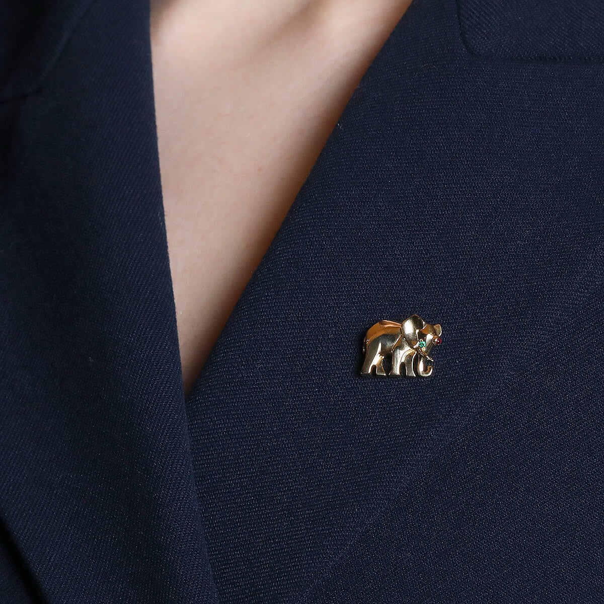 Cartier Elephant emerald, ruby and gold brooch.