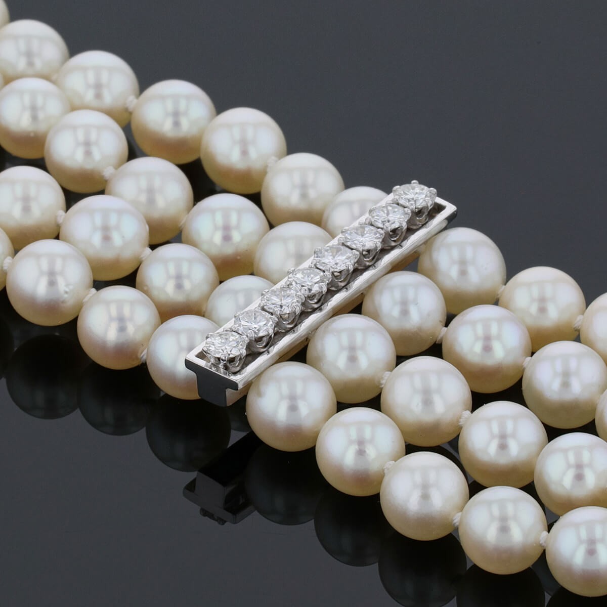 Cultured pearls, diamonds and gold bracelet