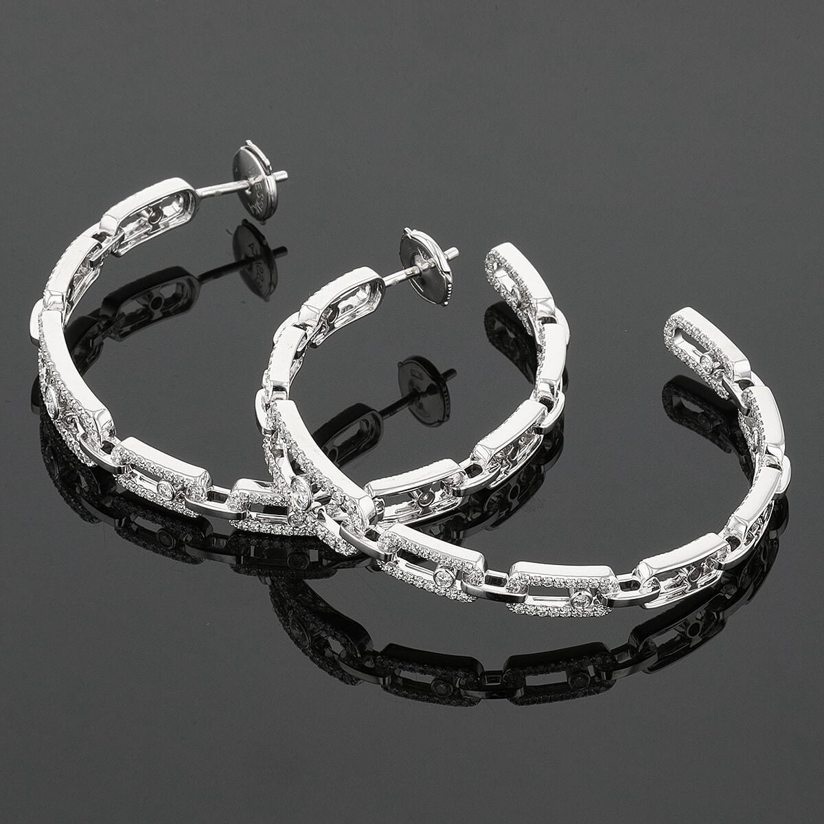 Messika Move Link diamonds and gold earrings