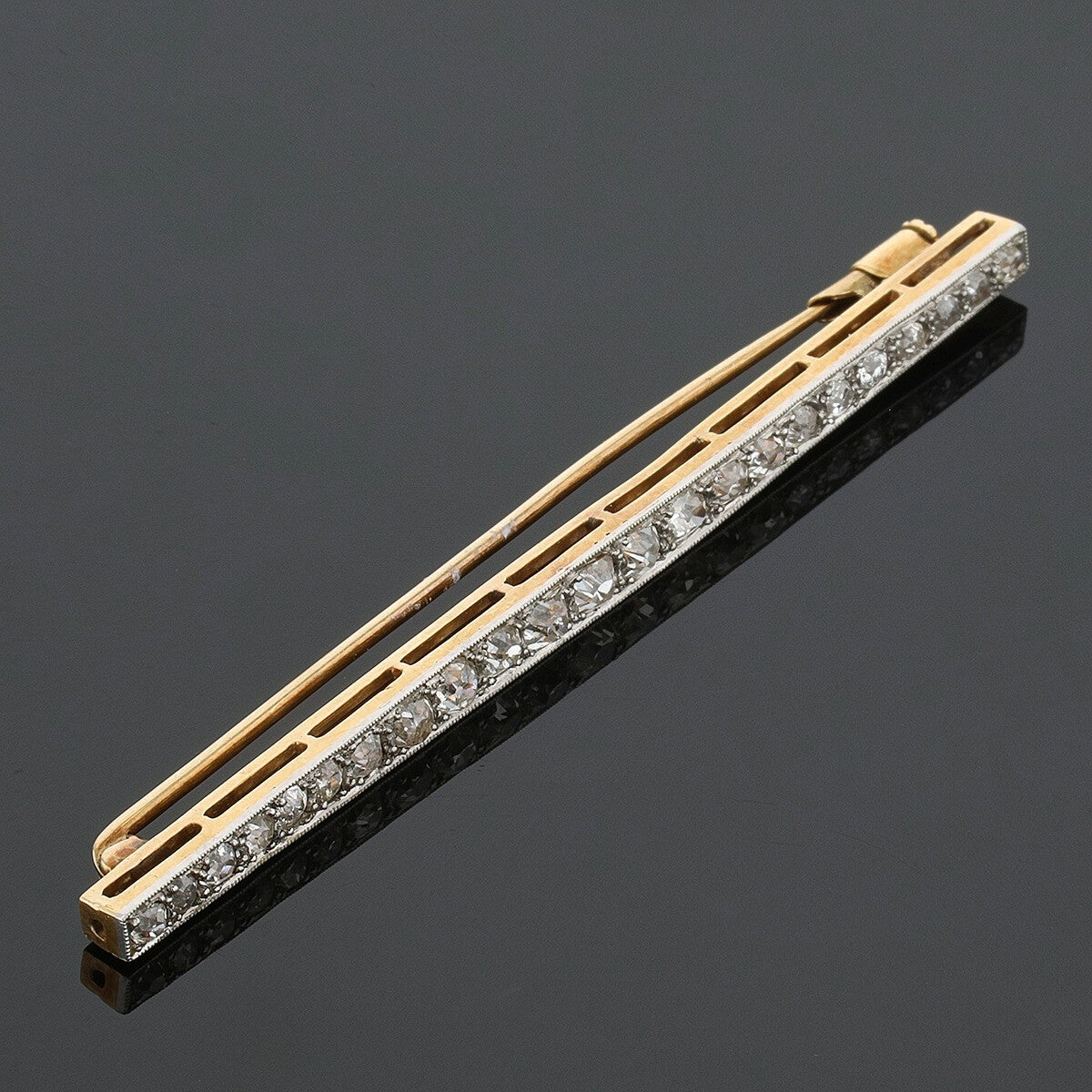 Platinum, gold and diamonds brooch