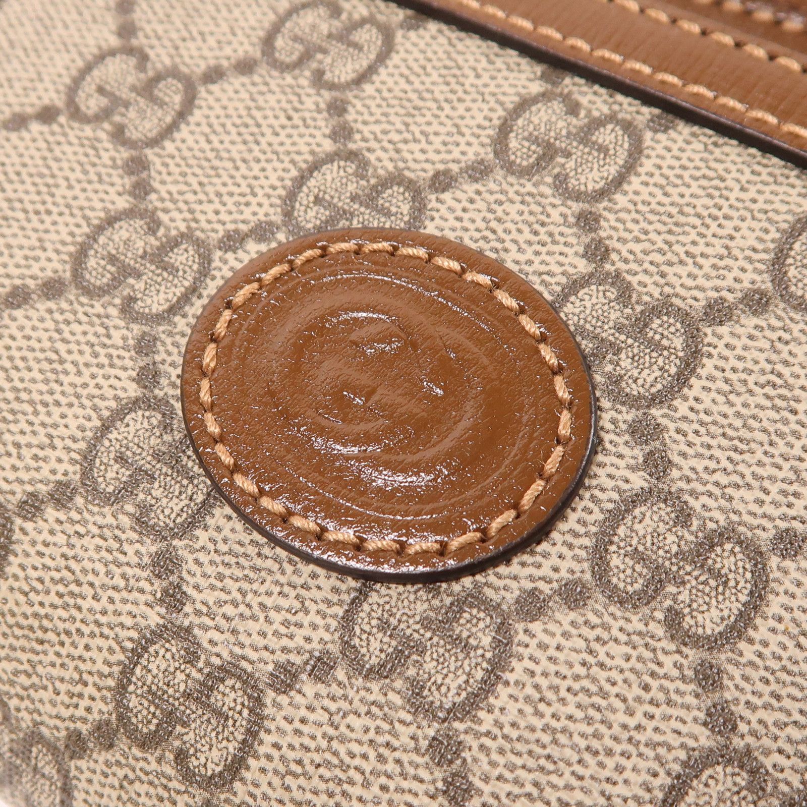 Gucci GG Supreme Monogram Textured Calfskin Retro Interlocking G Belt Bag