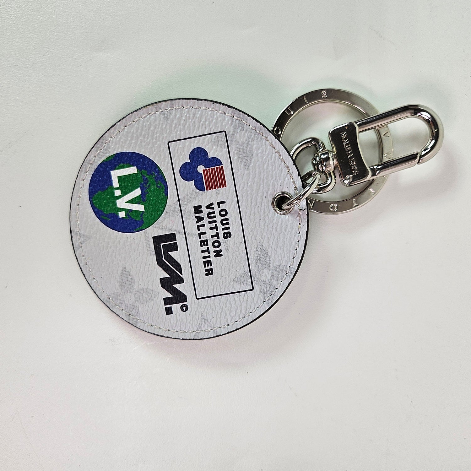 Louis Vuitton Round Illustre Keyhold Gray Monogram Logo Story