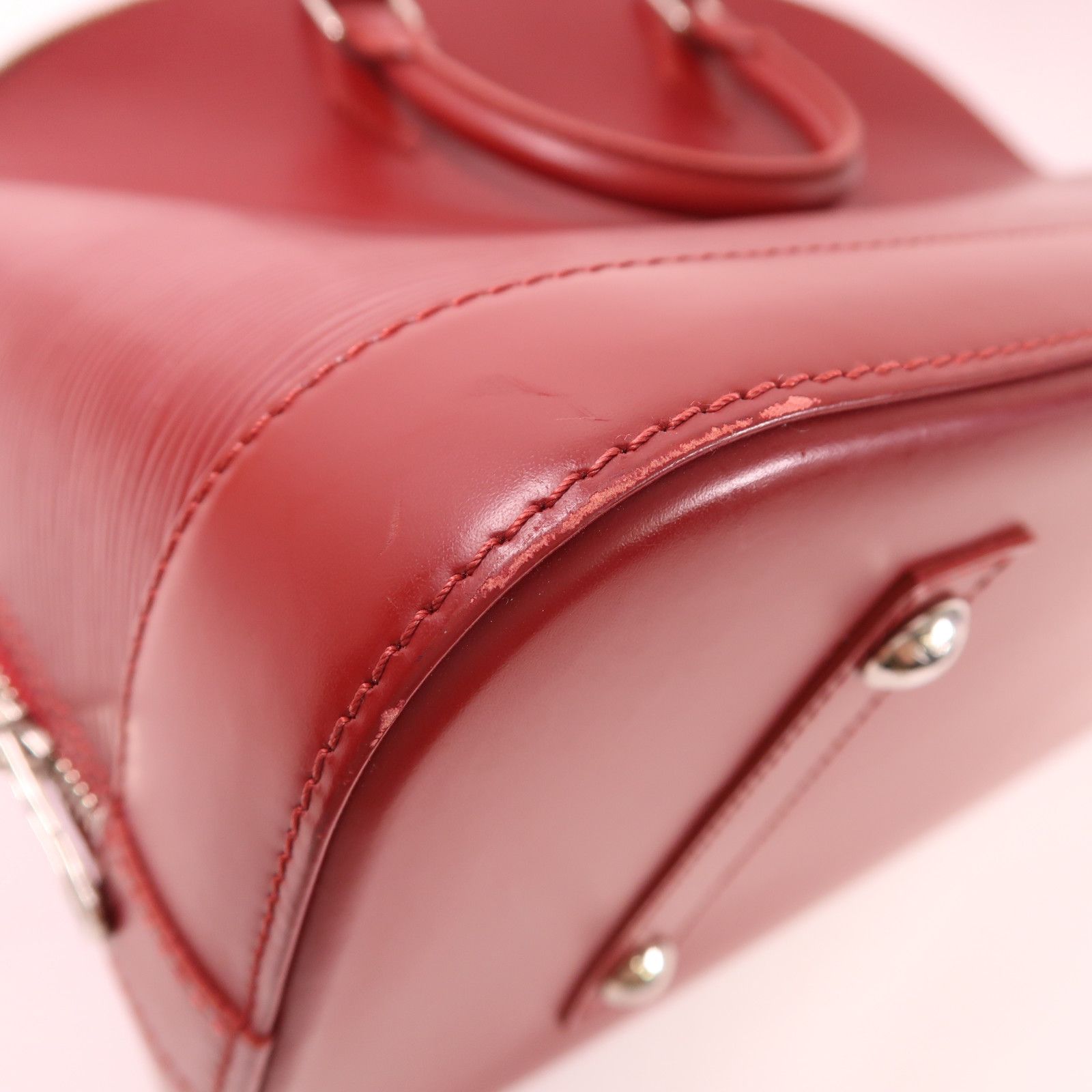 Louis Vuitton Epi Alma Pm Silver-back Handbag Red Handbag M 40490
