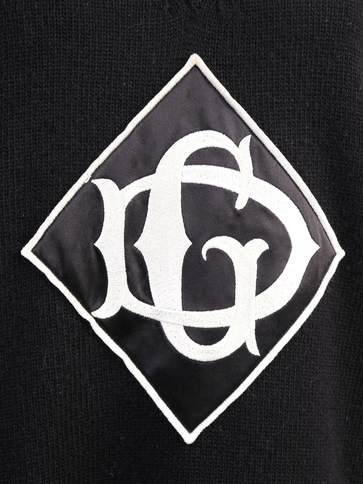 Excellent Dolce Gabbana Black Wool V-Neck Sweater with Logo