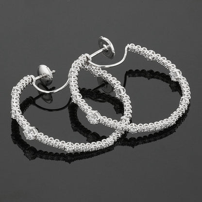 Chopard LÕHeure du Diamant diamonds and gold earrings