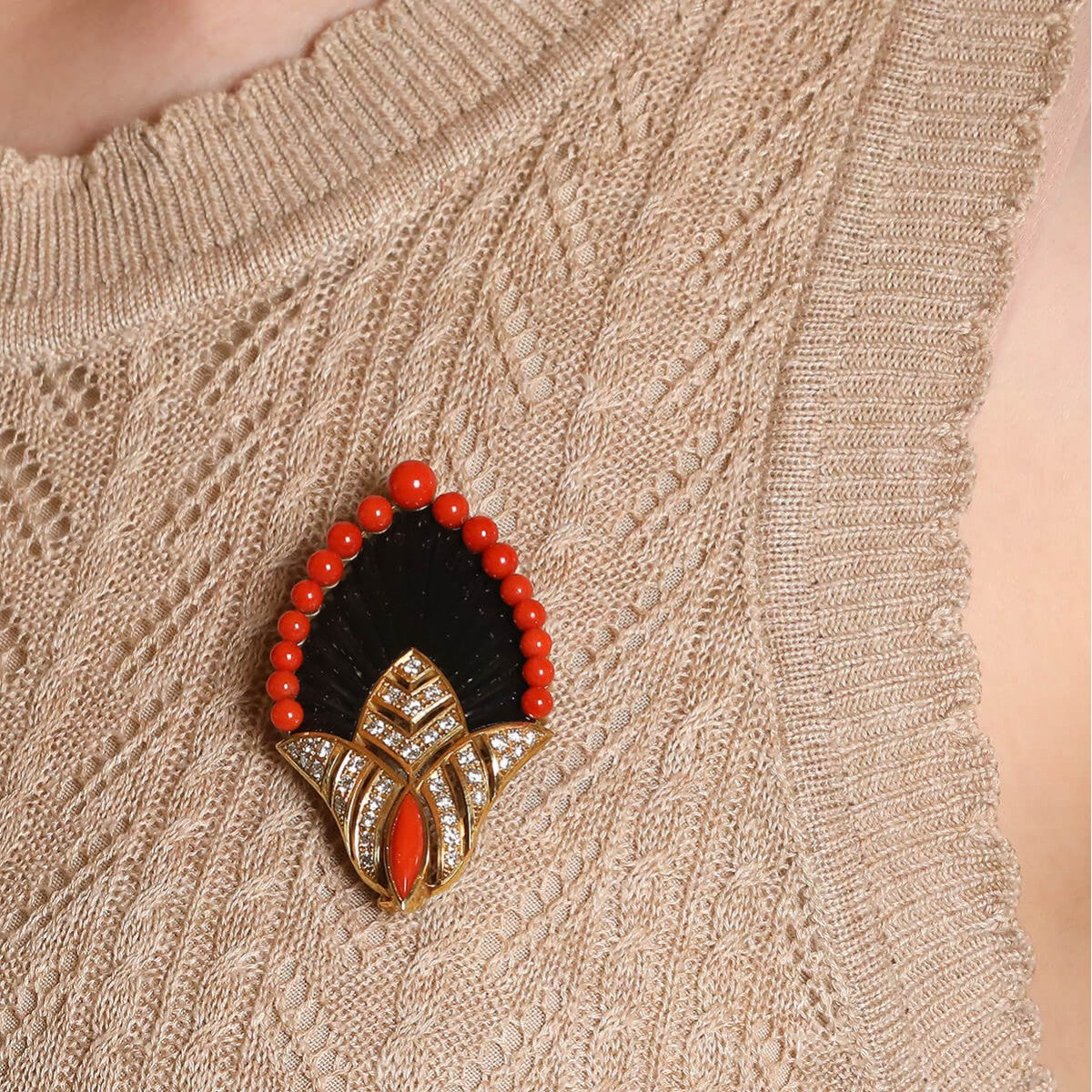 Coral, onyx, diamonds and gold brooch