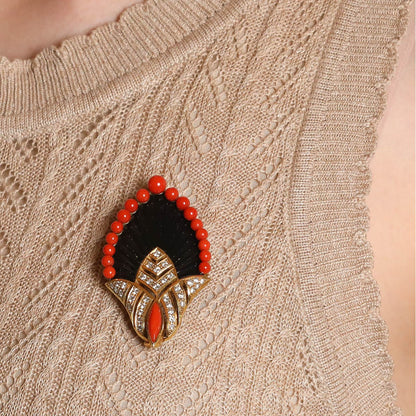Coral, onyx, diamonds and gold brooch