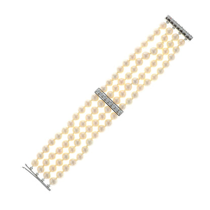 Cultured pearls, diamonds and gold bracelet