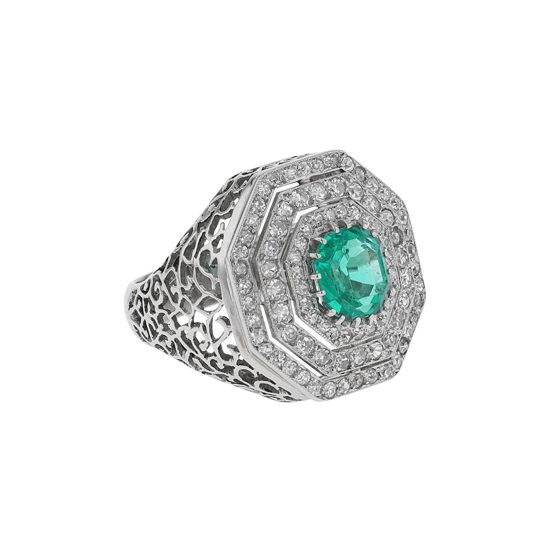 Diamonds, emerald and platinum ring