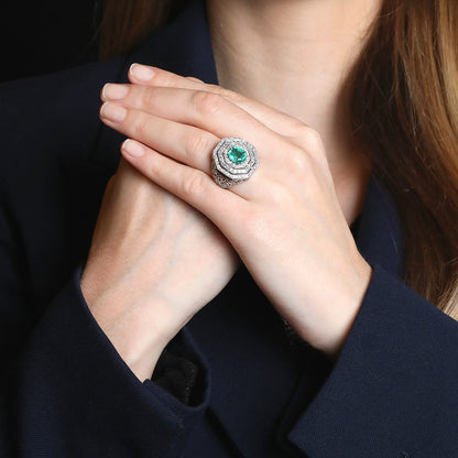 Diamonds, emerald and platinum ring