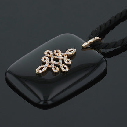 Diamonds, onyx and gold necklace