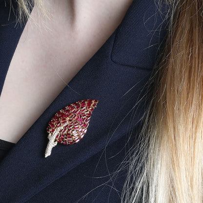 Diamonds, rubies and gold brooch