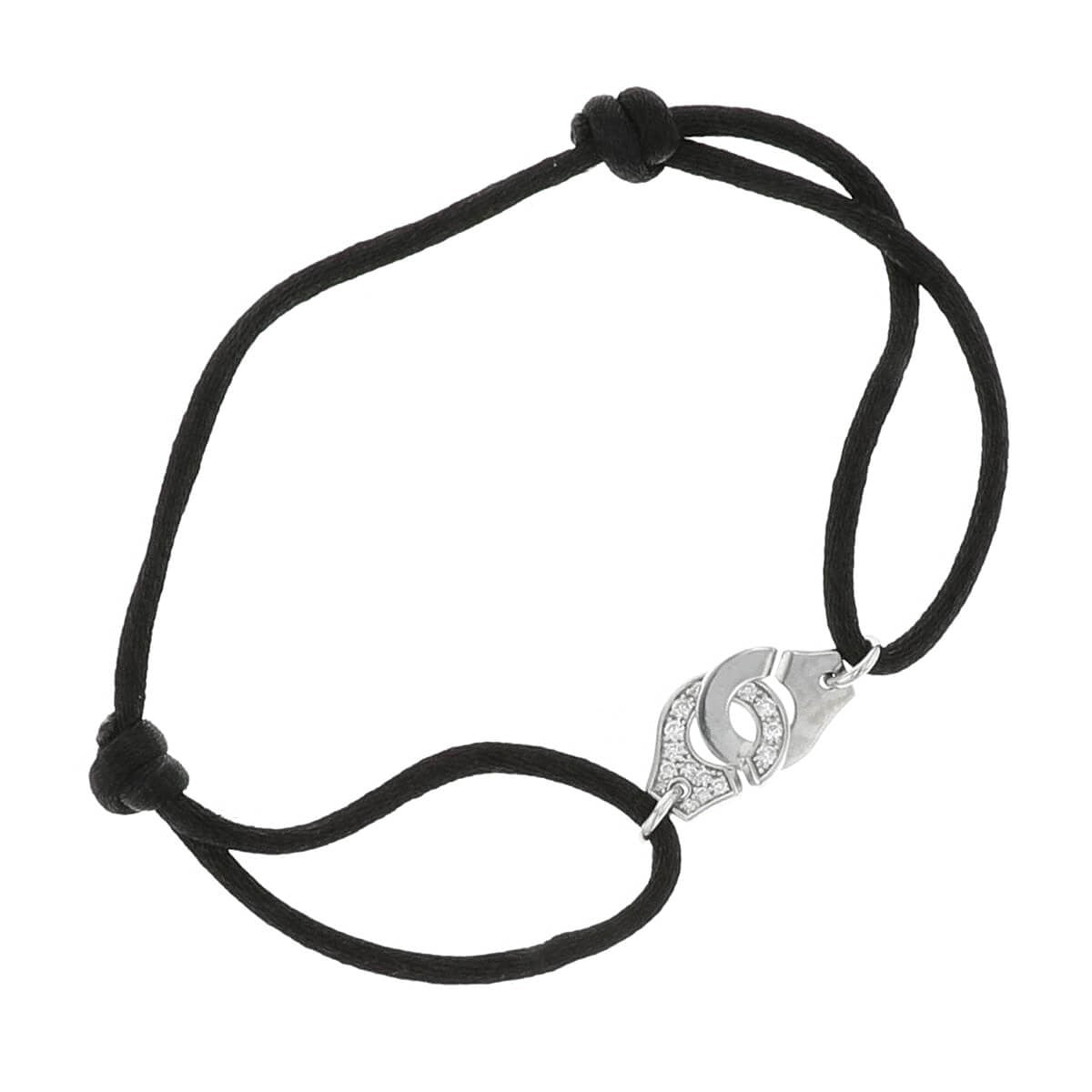 Dinh Van Menottes R10 diamonds and gold bracelet