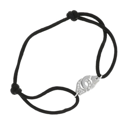 Dinh Van Menottes R10 diamonds and gold bracelet
