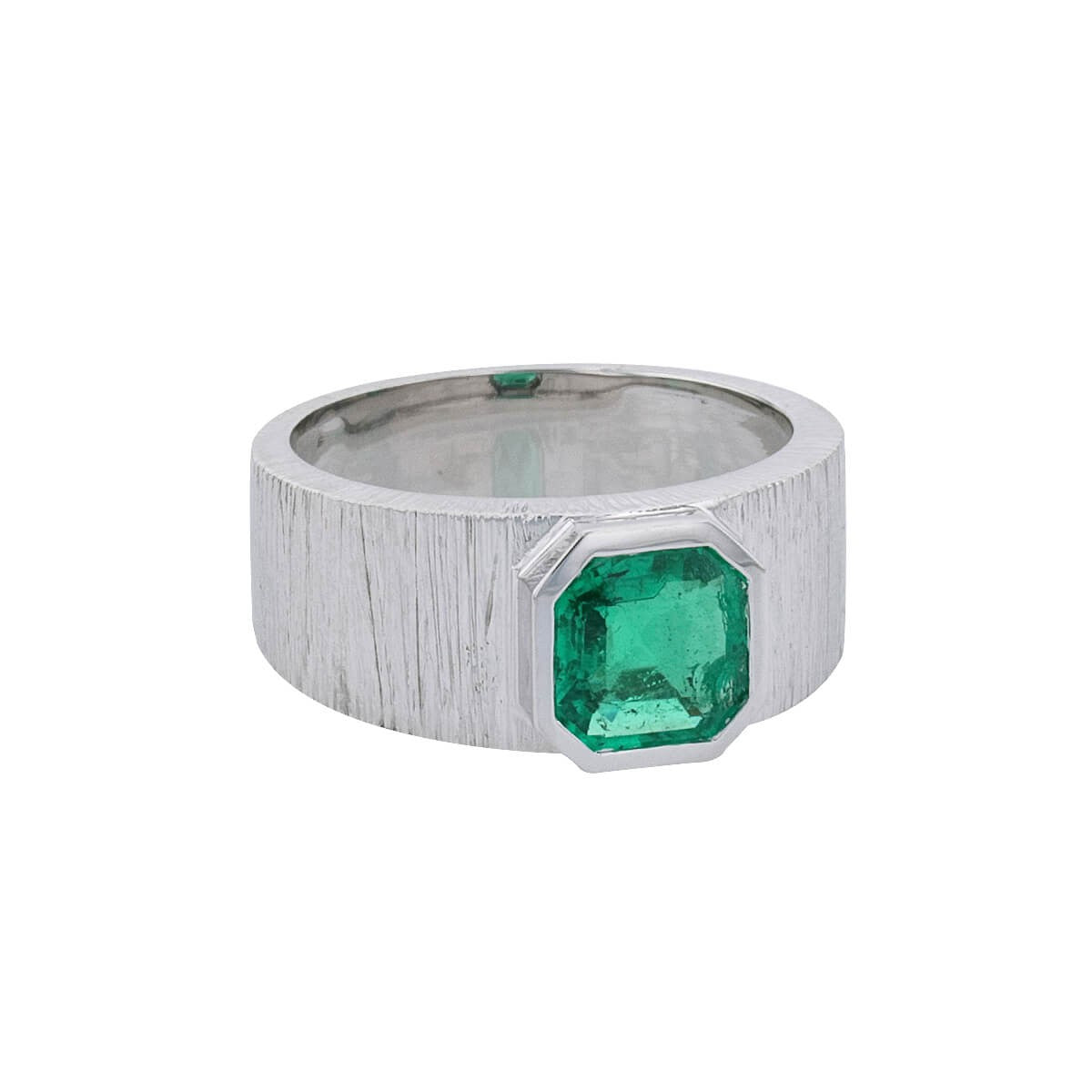 Emerald and gold ring