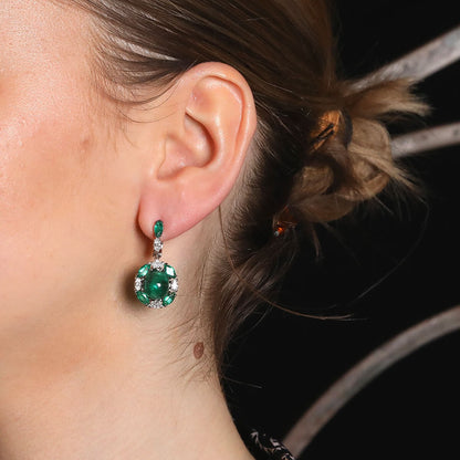 Emeralds, diamonds and gold earrings