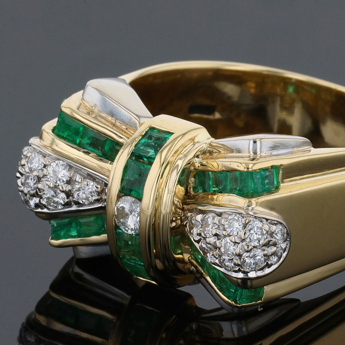 Emeralds, diamonds and two tones gold ring