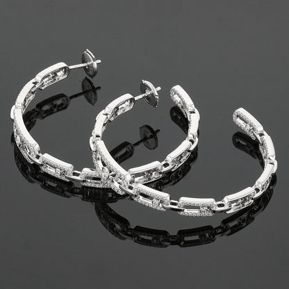 Messika Move Link diamonds and gold earrings