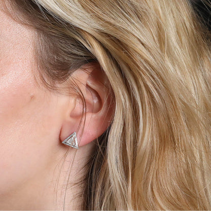 Messika  diamonds and gold earrings