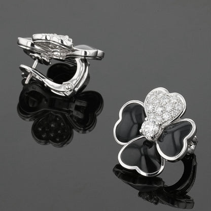 Van Cleef &amp; Arpels Cosmos onyx, diamonds and gold earrings