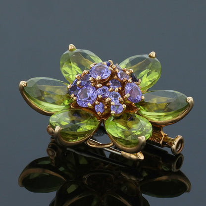 Van Cleef &amp; Arpels Hawa peridots, amethysts and gold brooch
